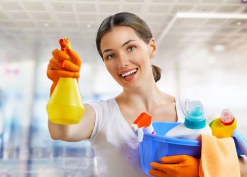 Cleaning team preparing equipment for a safe deep cleaning service in Islington