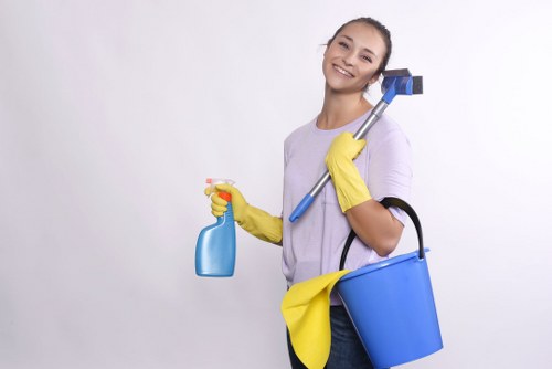 Commercial shopfront window cleaning on a busy Islington street